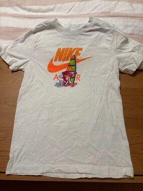 Nike White Tee with Bright Orange Swoosh and Multicolor Windsurf Graphic